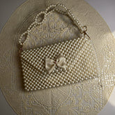 Faux pearls pouch