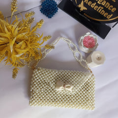 Faux pearls pouch
