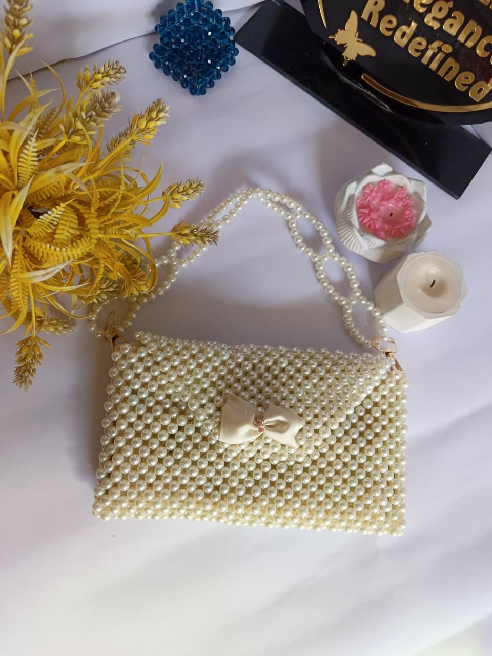 Faux pearls pouch